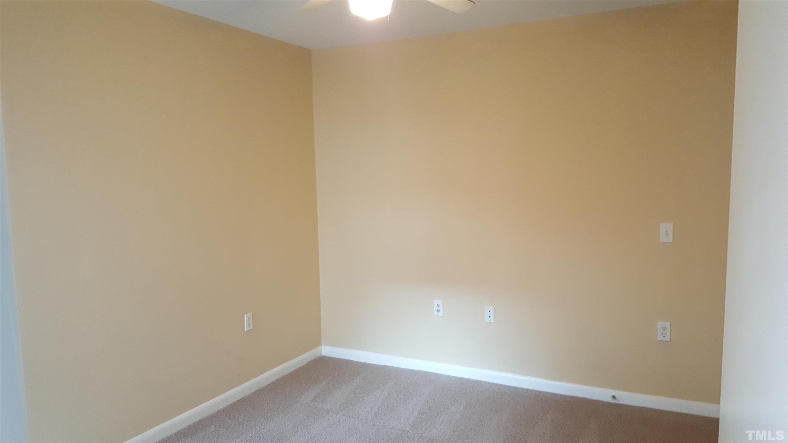 1440 Collegiate Circle, Unit 103 Raleigh, NC 27606 - Photo 9 of 10 a view of an empty room