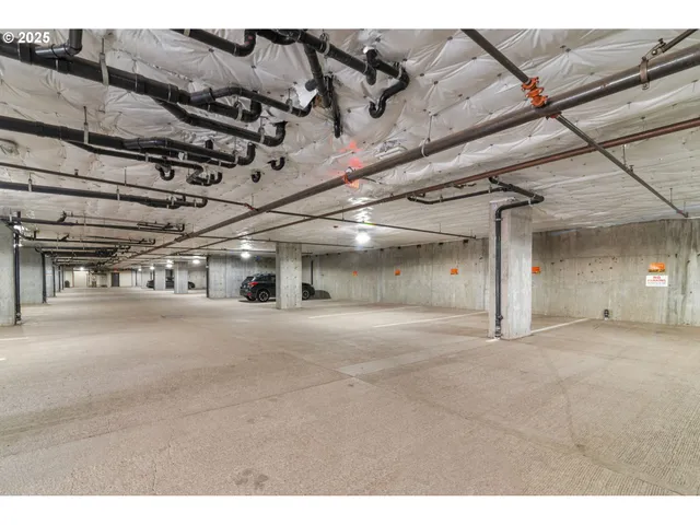 a view of a blue building with large windows