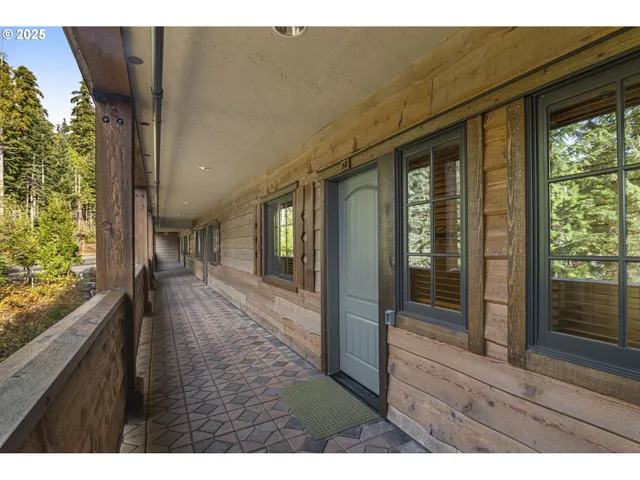 a view of living room and floor to ceiling window