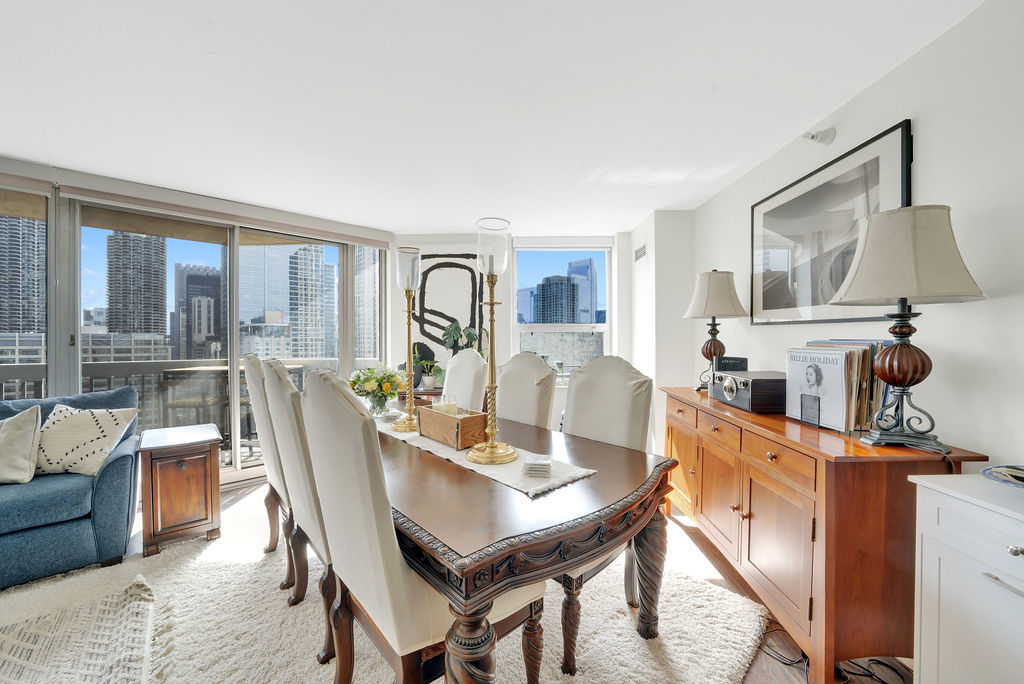 545 North Dearborn Street, Unit 2510 Chicago, IL 60654 - Photo 7 of 37 a view of a dining room with furniture window and outside view