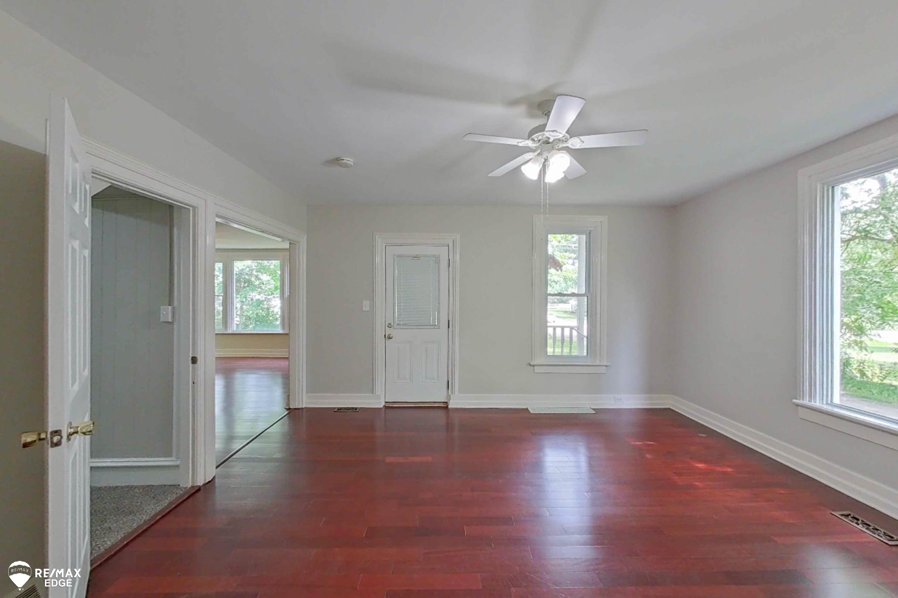 6231 Calkins Road Flint, MI 48532 - Photo 4 of 52 Front Door into Dining Rm