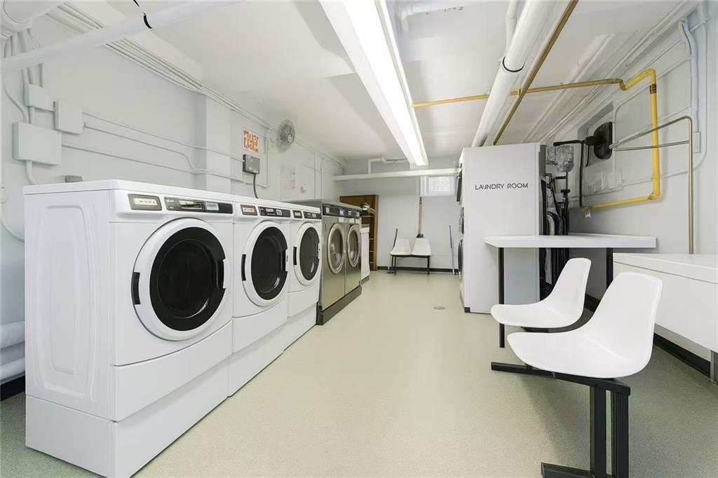 6801 Shore Road, Unit 2T Brooklyn, NY 11220 - Photo 15 of 20 a utility room with dryer and washer