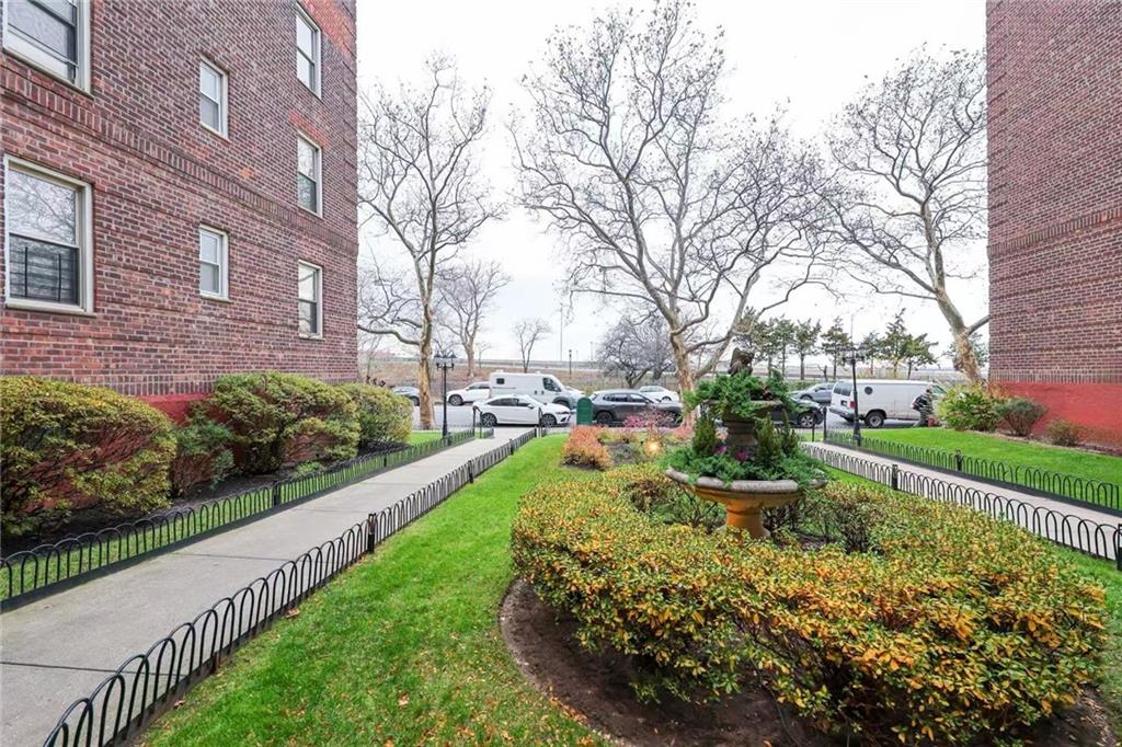 6801 Shore Road, Unit 2T Brooklyn, NY 11220 - Photo 16 of 20 a view of a garden with flower plants
