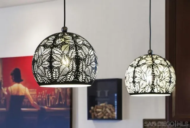 a view of a kitchen with sink and cabinets