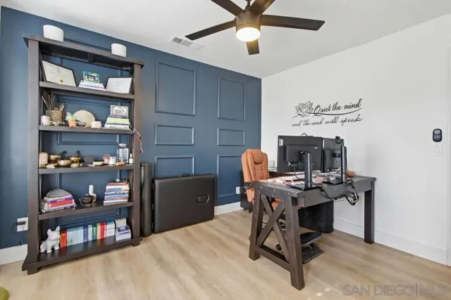 a bathroom with a shower and a toilet