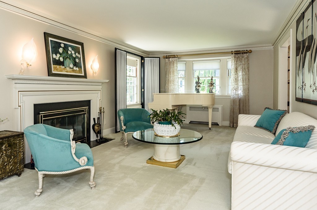 36 Sheldon Road Newton, MA 02459 - Photo 3 of 16 a living room with furniture and a fireplace