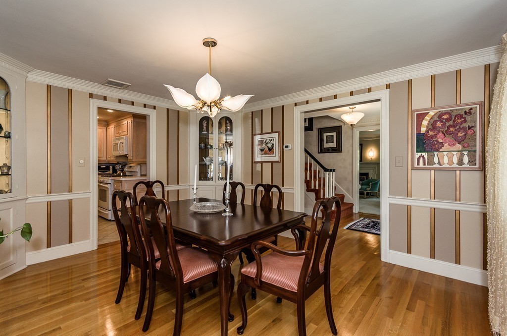 36 Sheldon Road Newton, MA 02459 - Photo 5 of 16 a view of a dining room with furniture and wooden floor