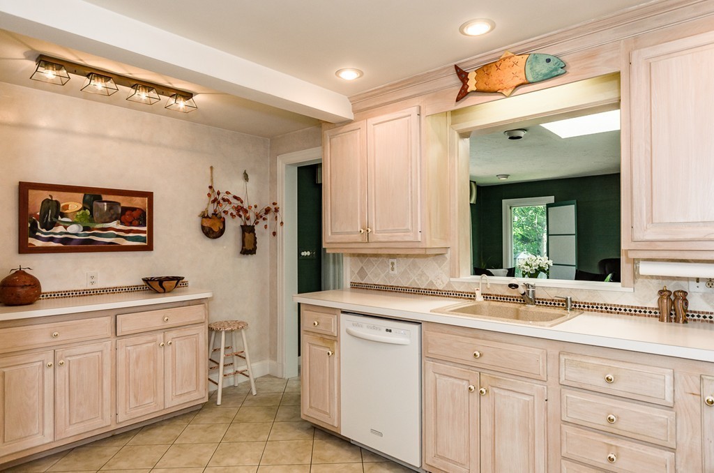 36 Sheldon Road Newton, MA 02459 - Photo 6 of 16 a kitchen with a sink and cabinets