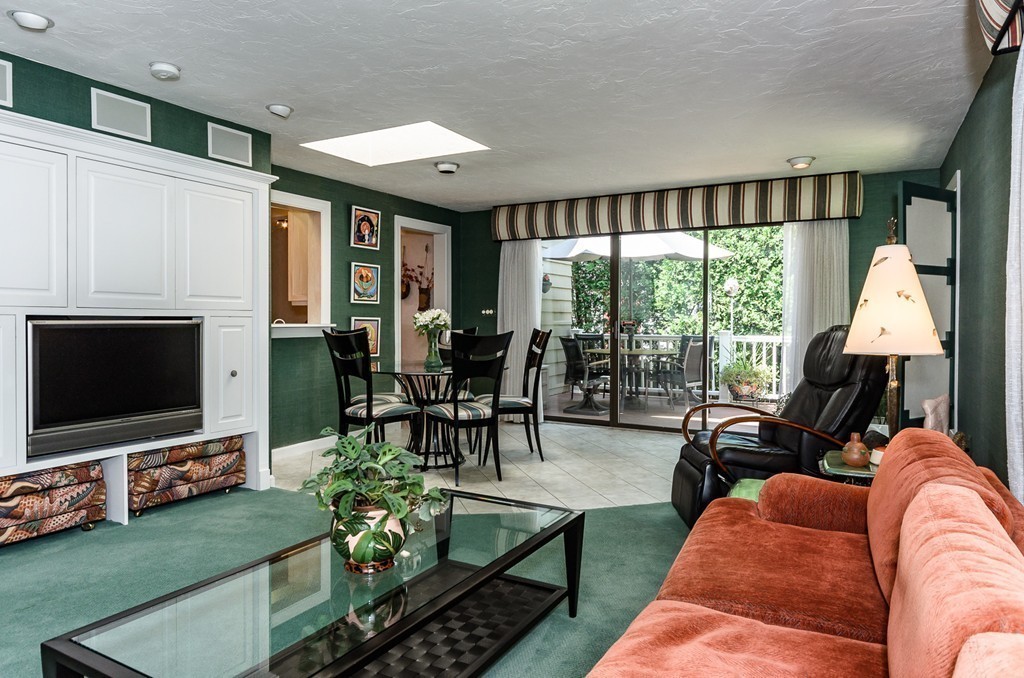 36 Sheldon Road Newton, MA 02459 - Photo 7 of 16 a living room with furniture and a flat screen tv