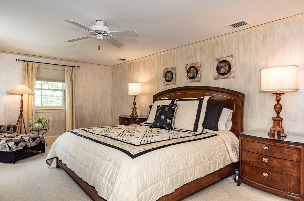 36 Sheldon Road Newton, MA 02459 - Photo 8 of 16 a bedroom with a bed and a lamp