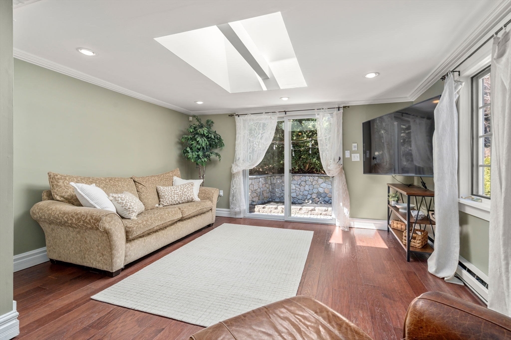 80 Fenwick Road Newton, MA 02468 - Photo 18 of 35 a living room with furniture and a large window
