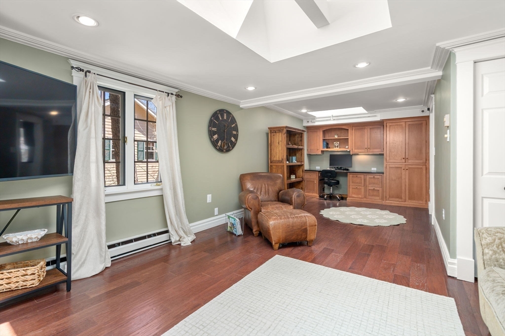 80 Fenwick Road Newton, MA 02468 - Photo 19 of 35 a living room with furniture and a window
