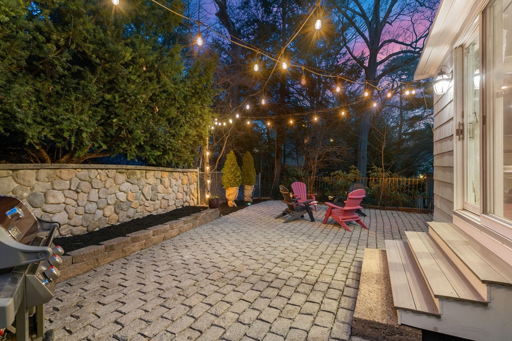 80 Fenwick Road Newton, MA 02468 - Photo 34 of 35 a view of a backyard with sitting area and furniture