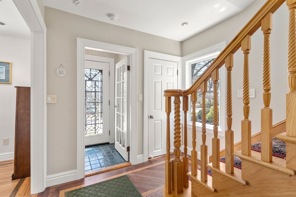 80 Fenwick Road Newton, MA 02468 - Photo 5 of 35 a view of an entryway with wooden floor and stairs
