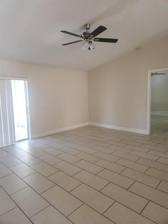 11608 Southwest 50th Circle Ocala, FL 34476 - Photo 2 of 7 a view of a room with washing machine