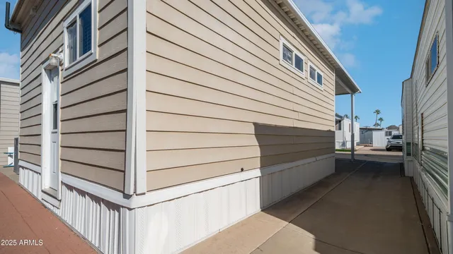 a view of a balcony with furniture