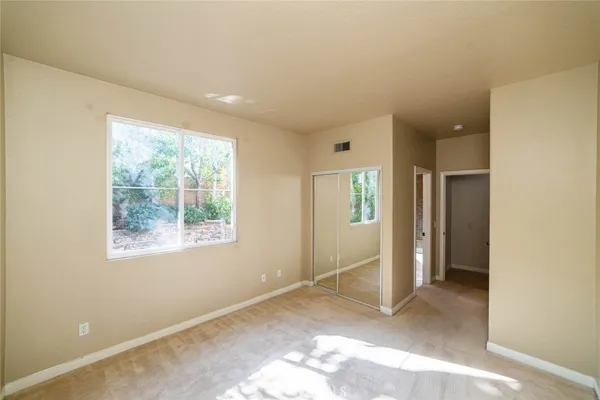 an empty room with windows