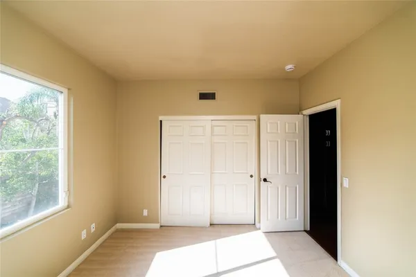 an empty room with windows