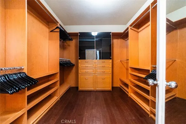 a view of front door and wooden floor