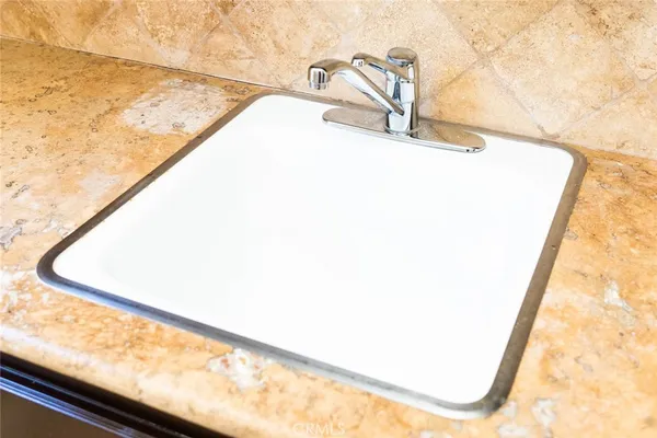 a view of a garden in front of a house