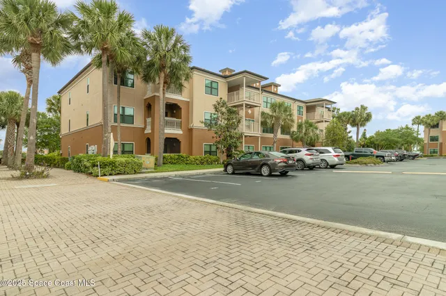 a kitchen with stainless steel appliances granite countertop a sink and a granite counter tops