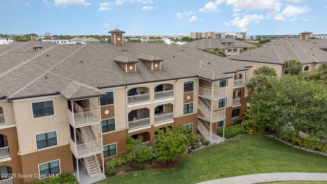 a view of a park with large trees