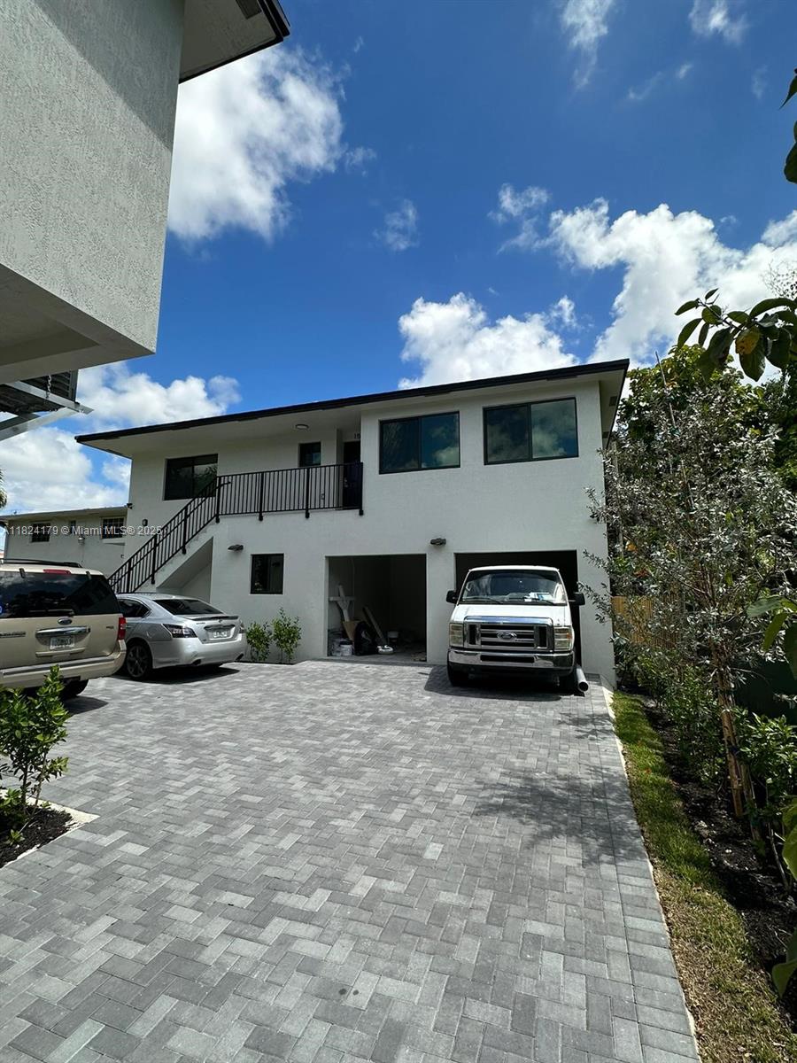 147 Northwest 61st Street Miami, FL 33127 - Photo 6 of 17 a view of a car garage