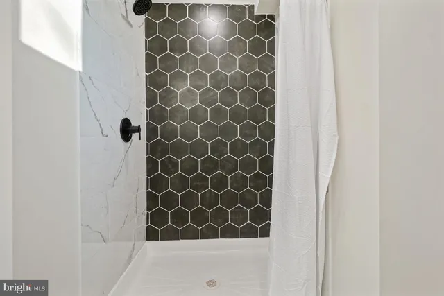 a view of a storage & utility room with washer and dryer