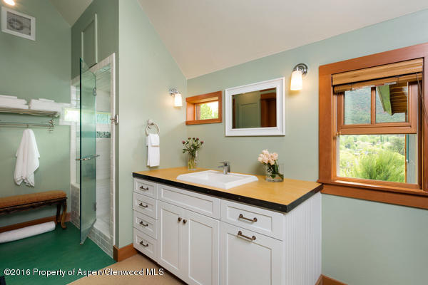 216 Curtis Lane Basalt, CO 81621 - Photo 13 of 32 a bathroom with a sink and a mirror