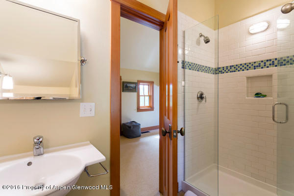 216 Curtis Lane Basalt, CO 81621 - Photo 18 of 32 a bathroom with a tub and a shower