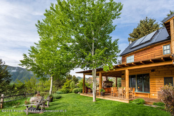 216 Curtis Lane Basalt, CO 81621 - Photo 2 of 32 a view of a house with a yard porch and sitting area