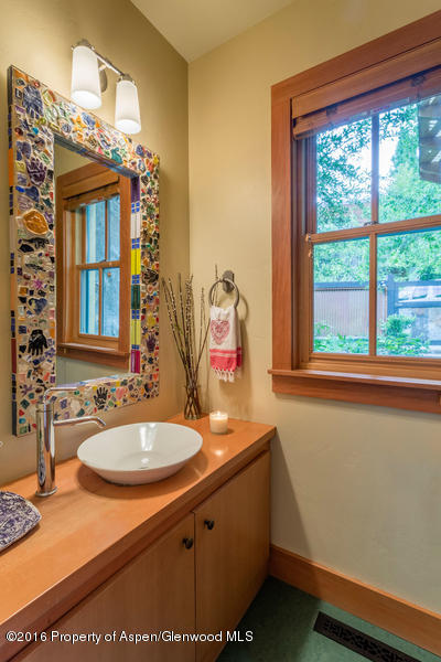 216 Curtis Lane Basalt, CO 81621 - Photo 25 of 32 a bathroom with a sink and a mirror