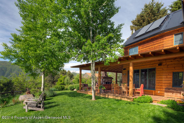 216 Curtis Lane Basalt, CO 81621 - Photo 31 of 32 a view of a house with a yard porch and sitting area