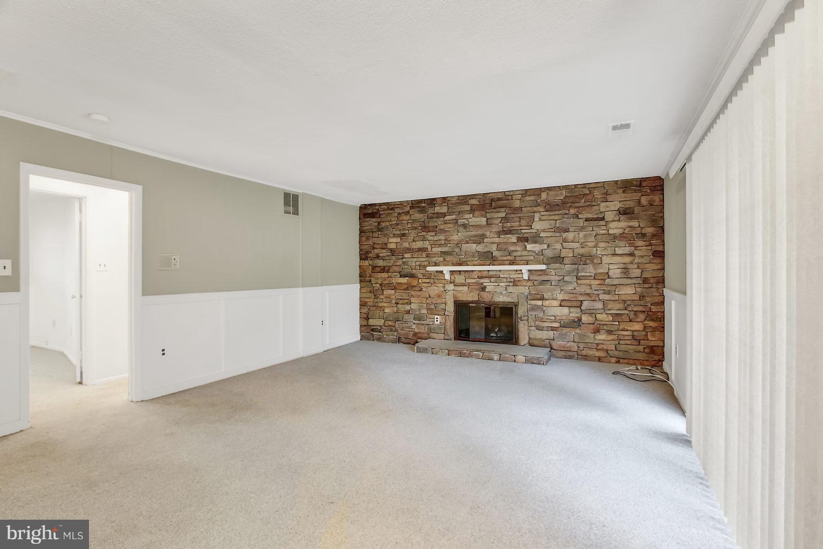 14934 Wellwood Road Silver Spring, MD 20905 - Photo 10 of 26 Family Room with Gas Fireplace