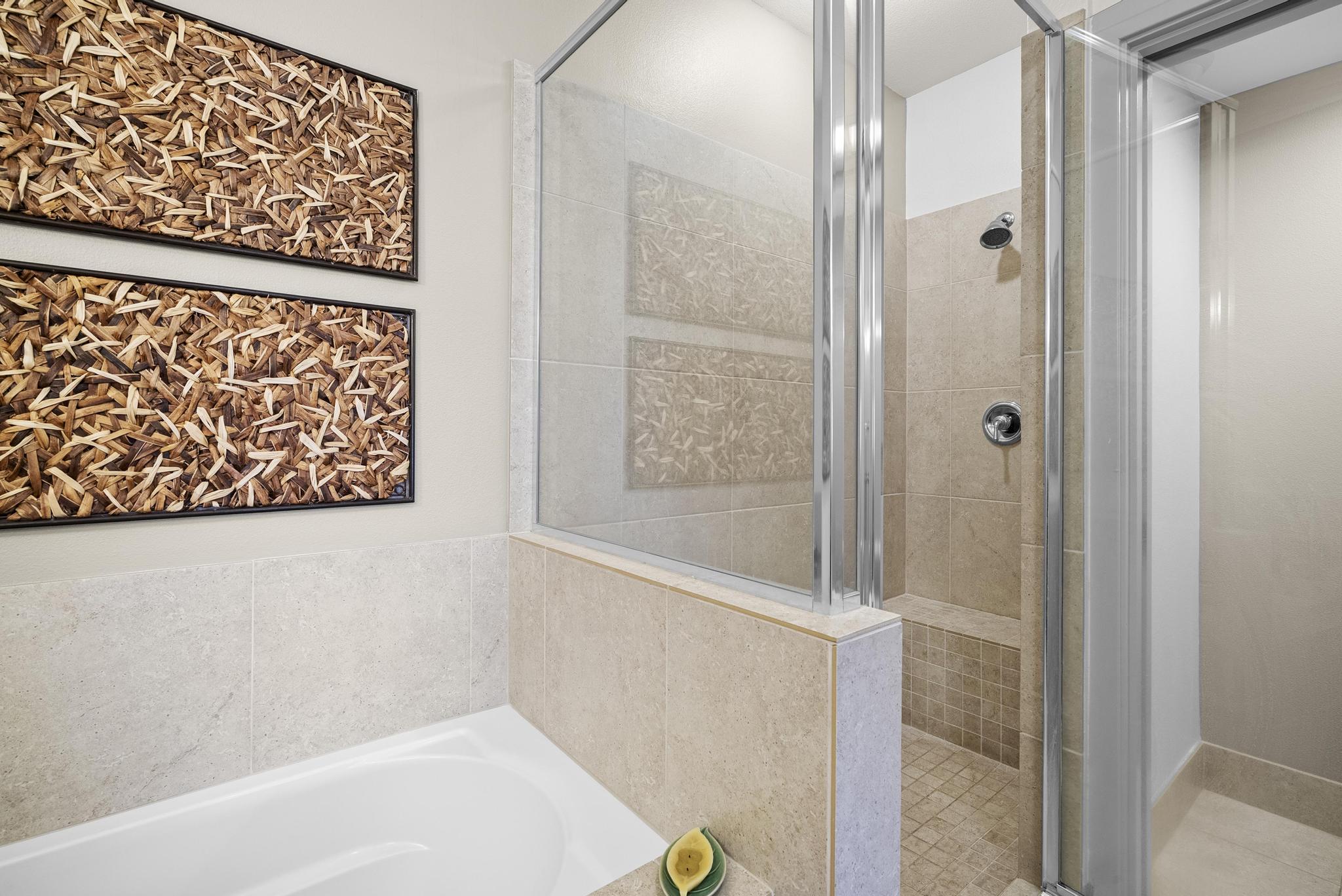 69-1033 Nawahine Place, Unit 18D Waikoloa, HI 96738 - Photo 14 of 25 a bathroom with a bathtub and shower