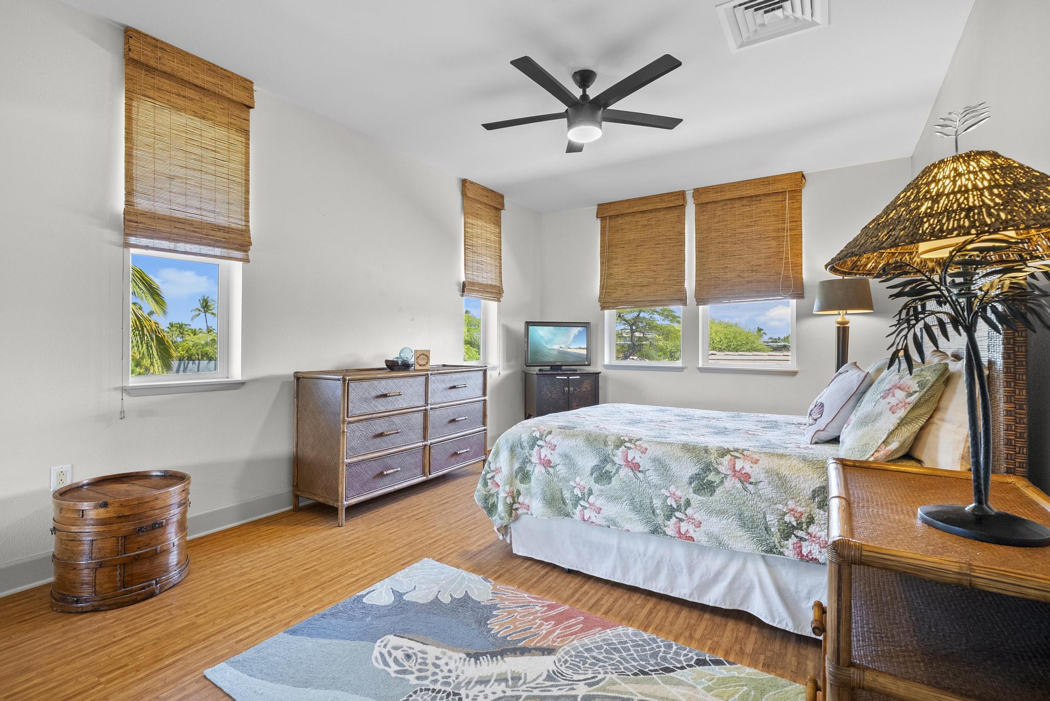 69-1033 Nawahine Place, Unit 18D Waikoloa, HI 96738 - Photo 15 of 25 a bedroom with furniture and a window