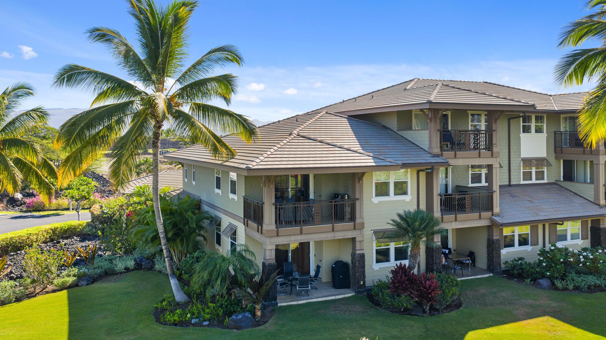 69-1033 Nawahine Place, Unit 18D Waikoloa, HI 96738 - Photo 17 of 25 a front view of a house with a garden