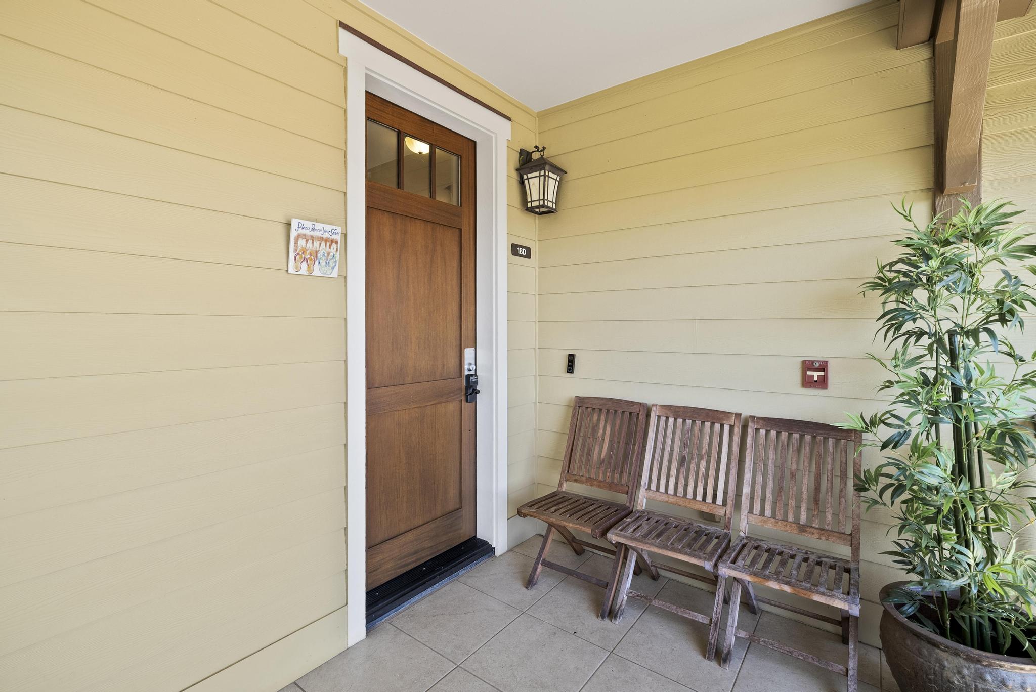 69-1033 Nawahine Place, Unit 18D Waikoloa, HI 96738 - Photo 8 of 25 a view of porch with a bench and potted plant
