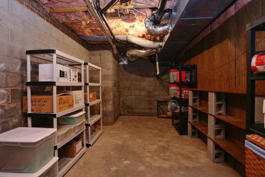 10420 Whitestone Road Raleigh, NC 27615 - Photo 22 of 24 This cool space in basement would make the perfect wine cellar. Craft room, exercise room or just old old storage! Potential Wine Cellar/Storage