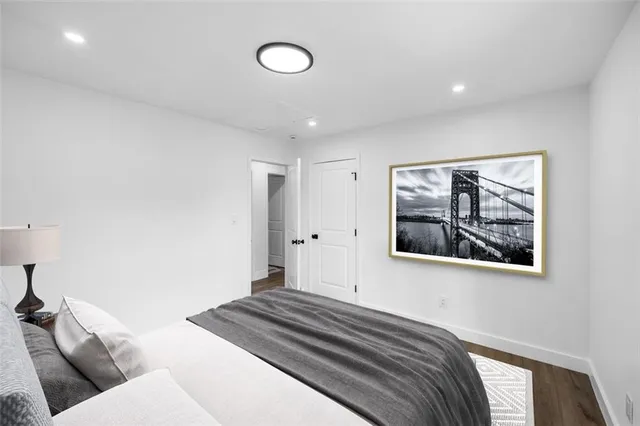 a view of wooden floor and windows in a room