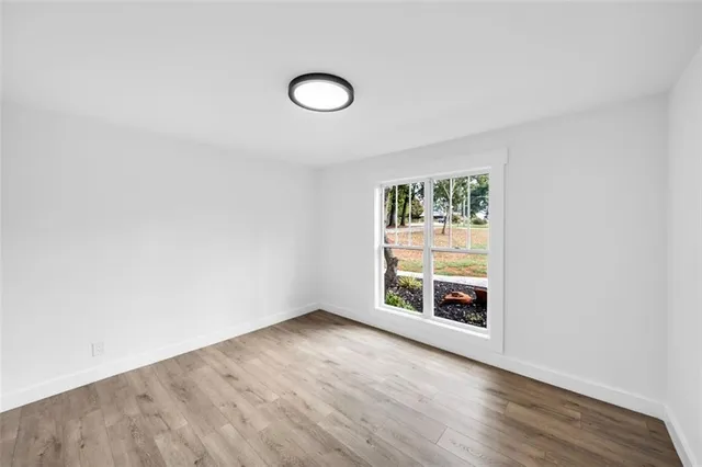a view of a livingroom with wooden floor