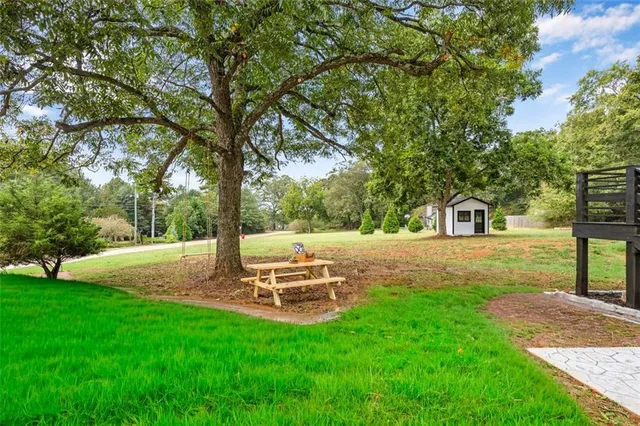front view of a house with a big yard