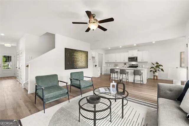 a living room with furniture and a window