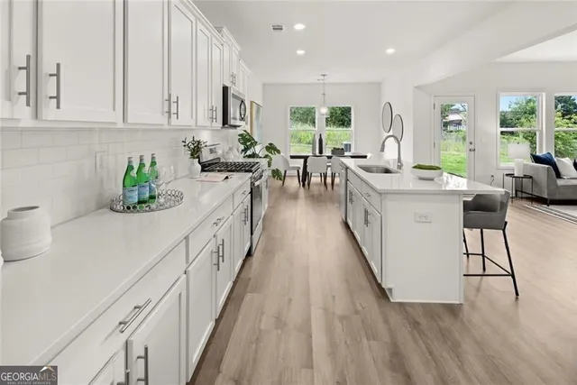 a kitchen with a large counter top space
