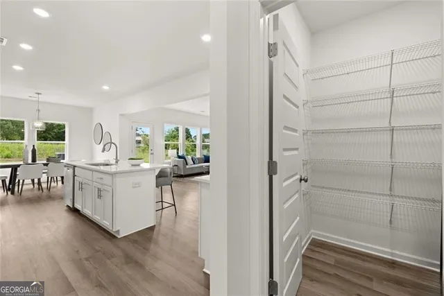 a view of a hallway with a white walls