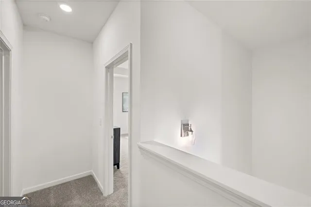 a view of kitchen with furniture and ceiling fan