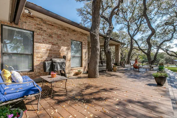 a view of a chairs and tables in the patio