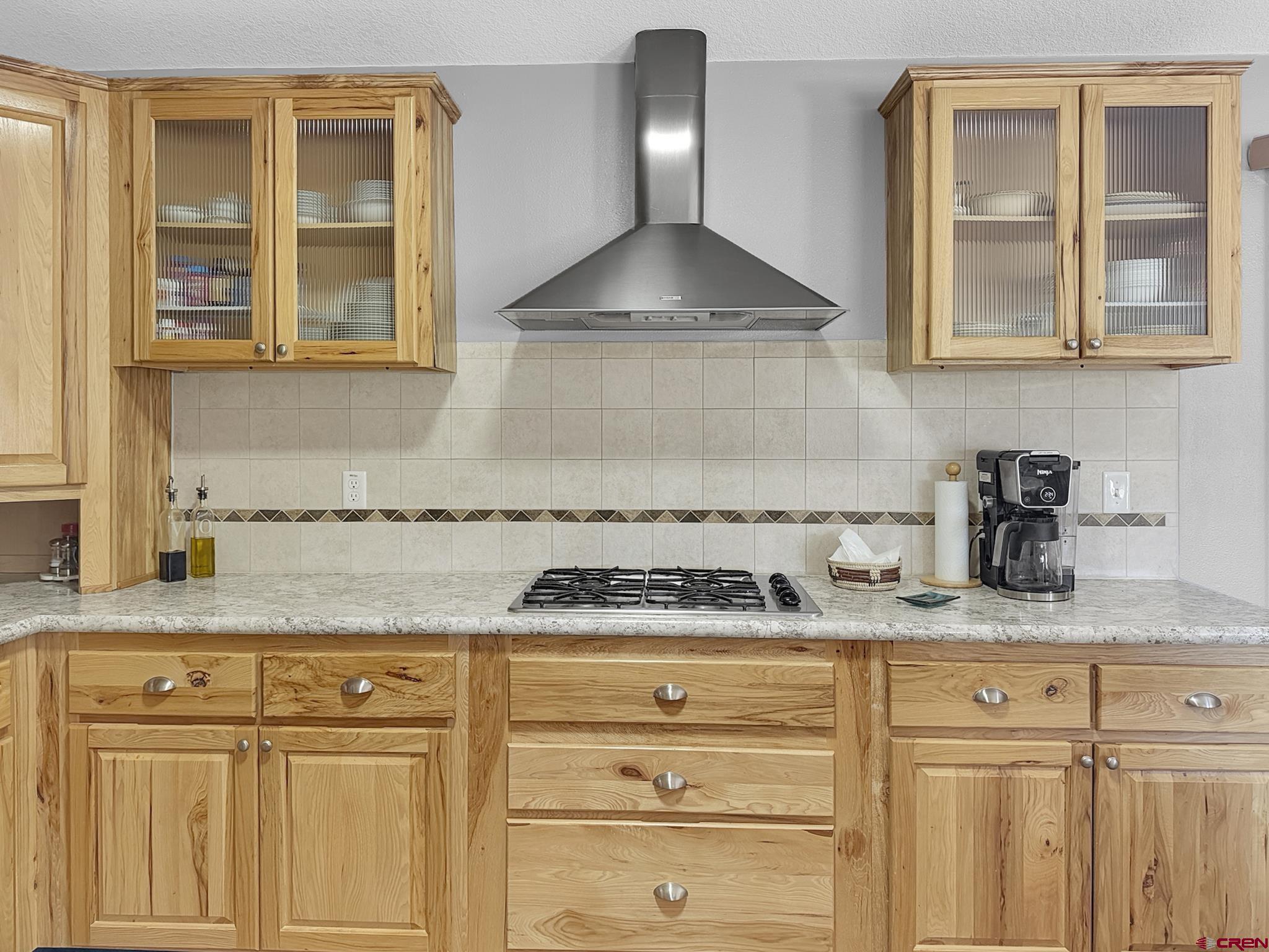 40331 D Road Crawford, CO 81415 - Photo 13 of 45 a kitchen with granite countertop stainless steel appliances sink and cabinets
