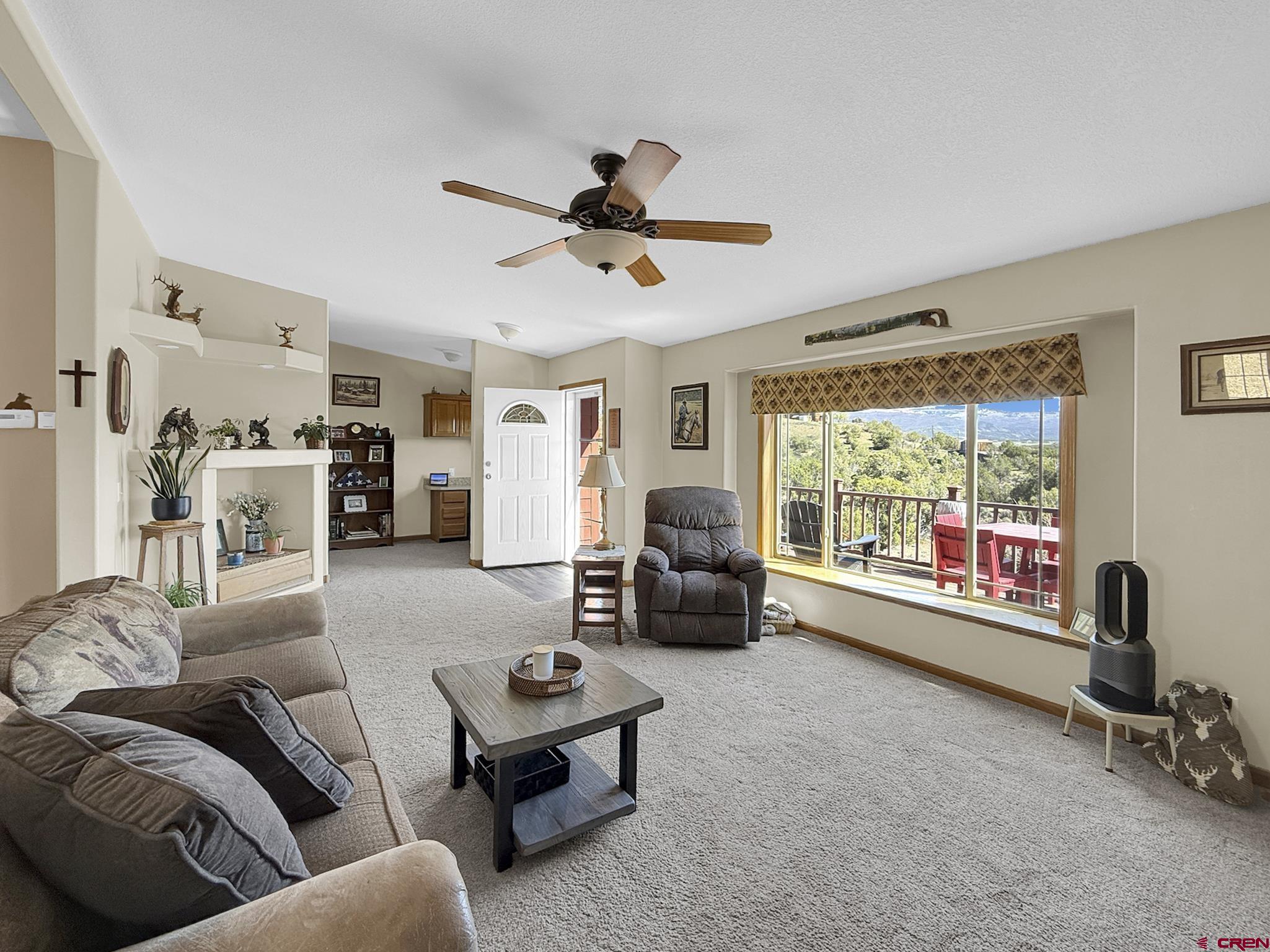40331 D Road Crawford, CO 81415 - Photo 15 of 45 a living room with furniture and a large window