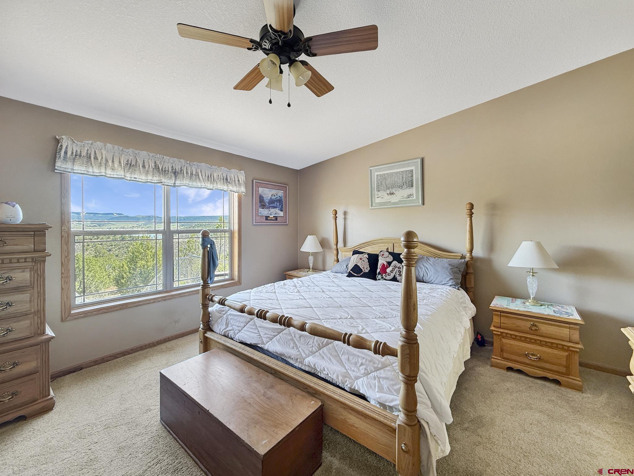 40331 D Road Crawford, CO 81415 - Photo 36 of 45 a bed room with a bed and a window